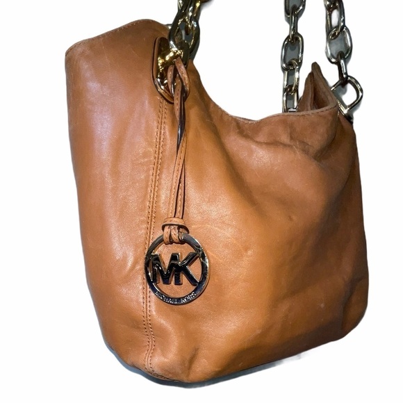Michael Kors Handbags - Michael Kors Lilly Lambskin leather tote bag. GUC